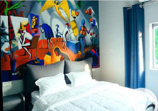 江永对于酒店的墙体彩绘而言更注重哪些方面？